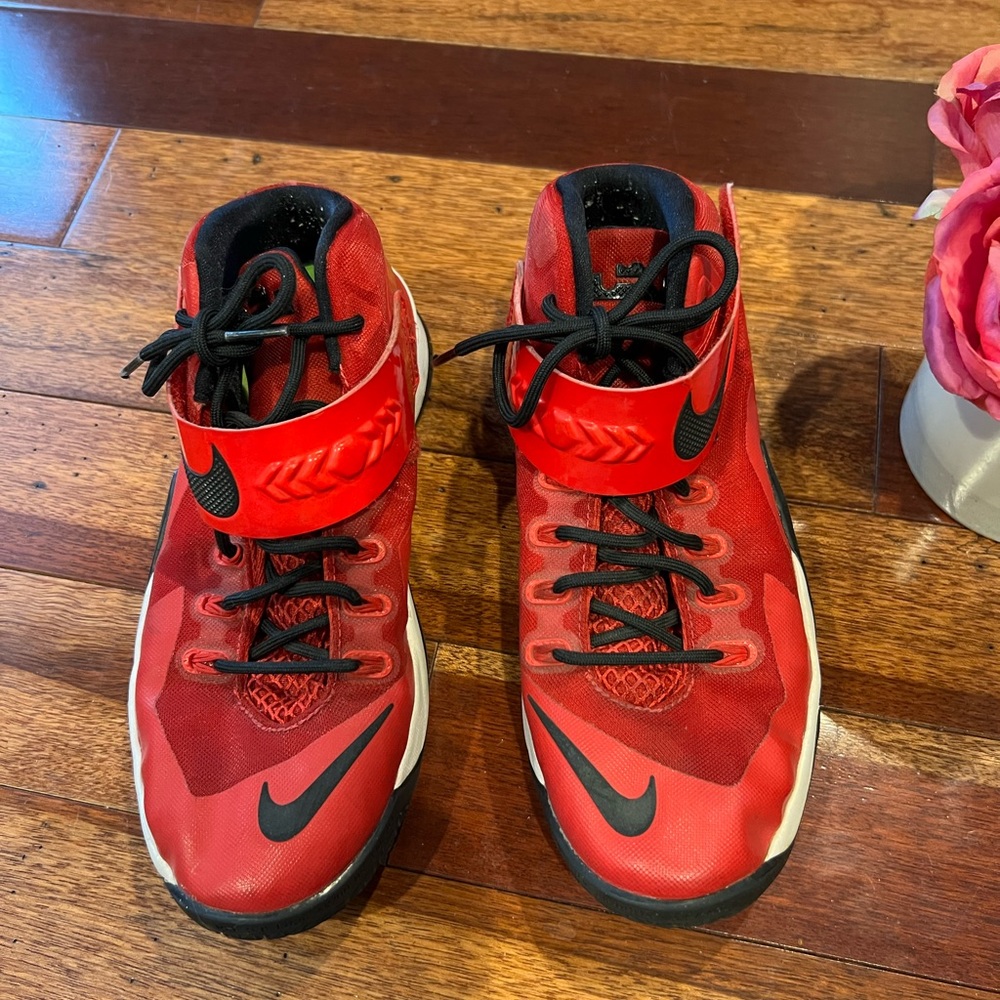 Nike Lebron red leather basketball sneakers. Size 7Y. Fits like women’s size 7.